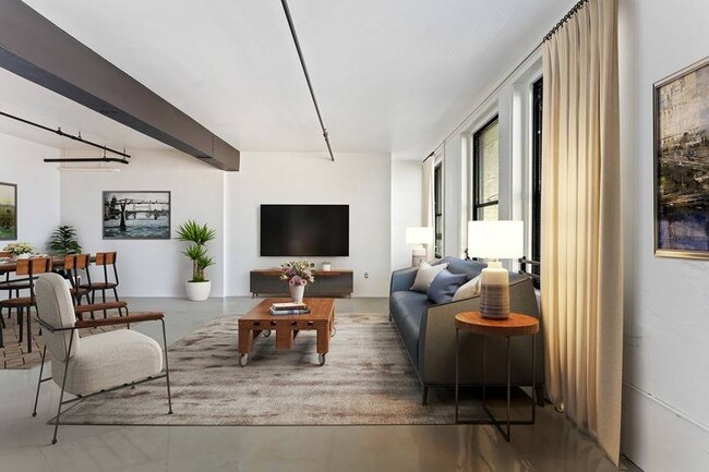 Sala de estar de la suite Penthouse - Arrive Broadway Lofts