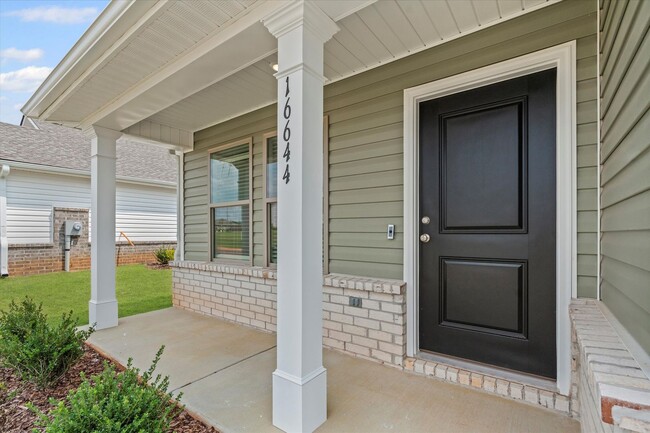 Building Photo - New 3BR Home in Whispering Woods – Modern ...