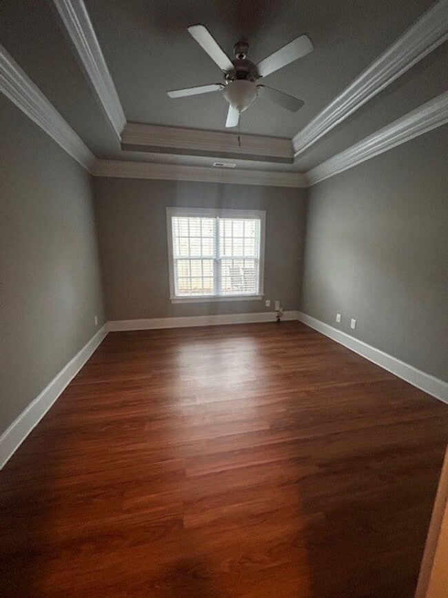 Building Photo - Luxury End Unit Townhome | Primary on Main | Private Patio | Move In Ready!!
