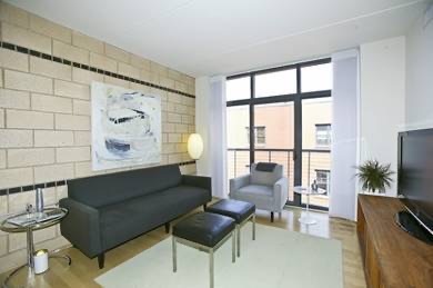 Living room w/ small balcony - 1529 14th St NW