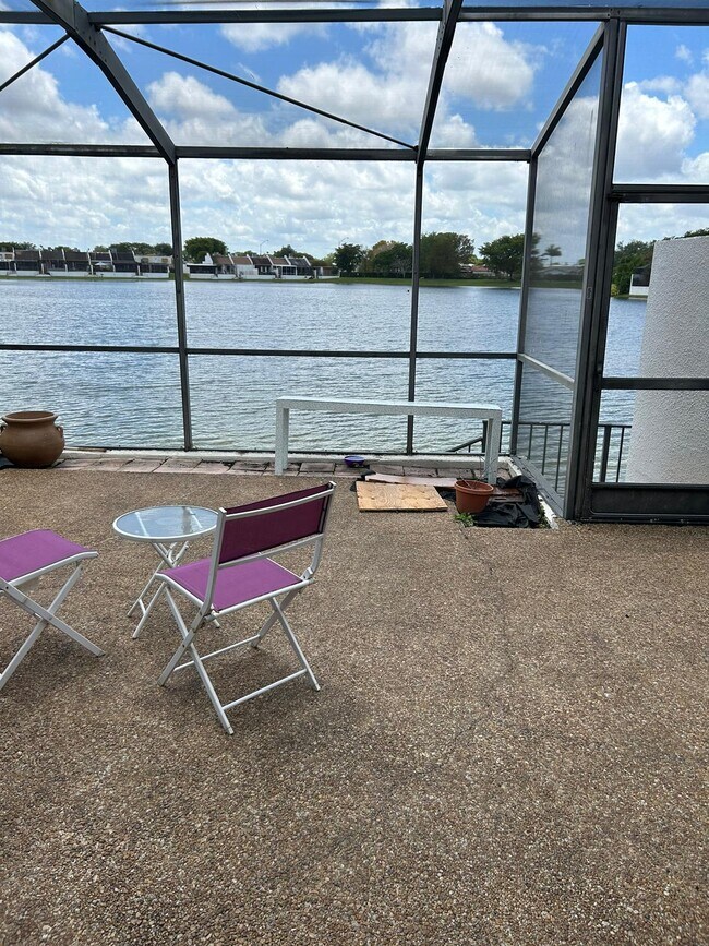 terrace with lake view - 1120 SW 131st Place Cir N