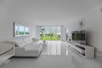 Building Photo - 10275 Collins Ave