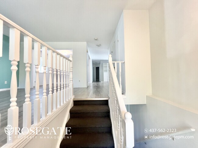 Building Photo - Spacious 3-Bedroom Main-Level Unit – 1,250...