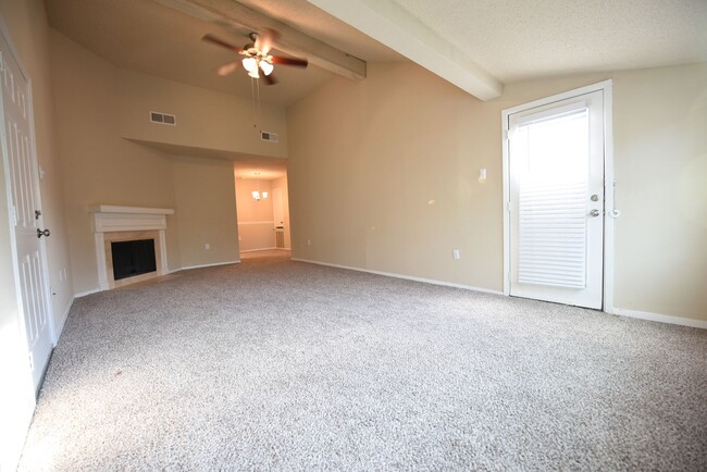 Building Photo - Second floor unit remodeled with fireplace!