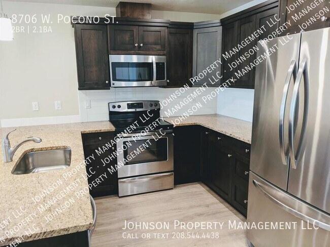 Building Photo - Stylish Garden City Townhome with Modern A...