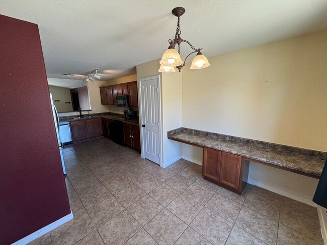 Building Photo - 7371 W Alicia Dr