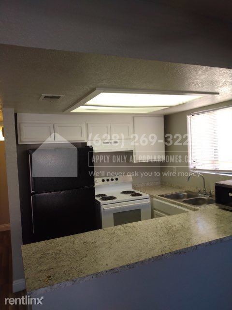Building Photo - 2 br, 2 bath 4plex - 6245 Bellota Drive Un...