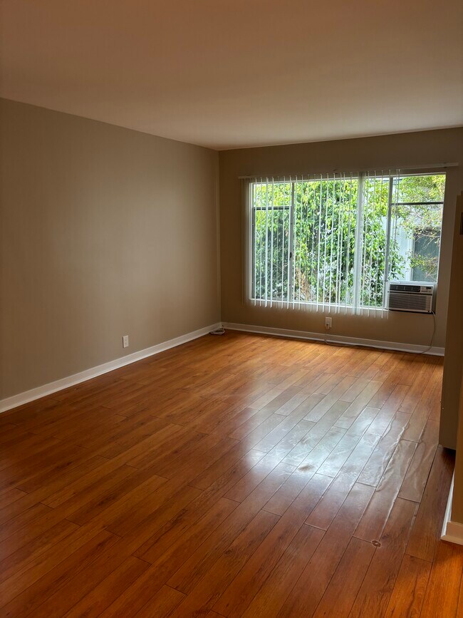 1x1 - Área de estar - 15th Street Apartments