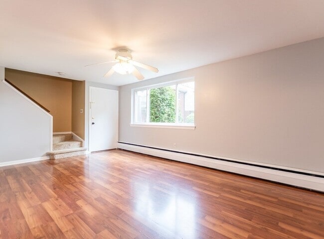 Living room (front entrance door pictured) - 52 Wilson Dr