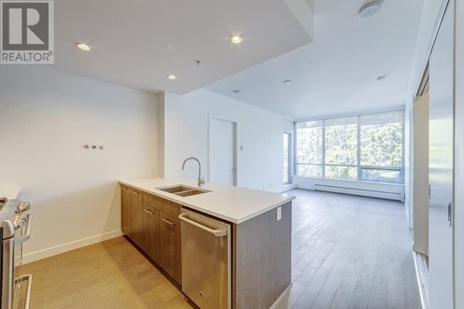 Building Photo - 9060-9060 University Crescent