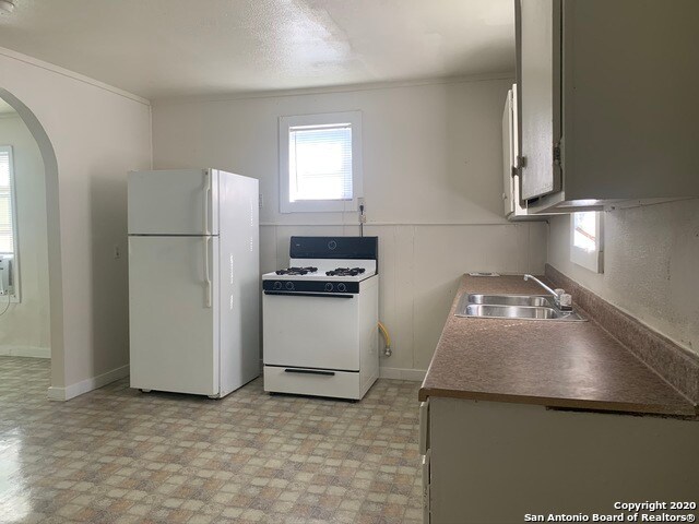 Foto del edificio - 1407 W Travis St