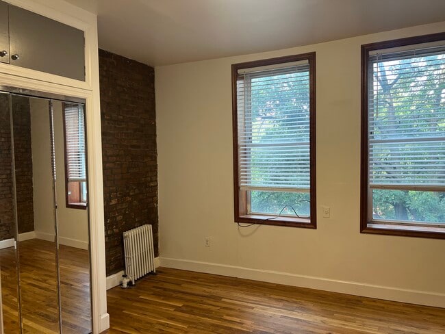 Large Bedroom w/mirrored closets - 764 Washington Ave