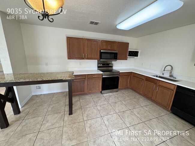Building Photo - 9035 Sycamore Cove