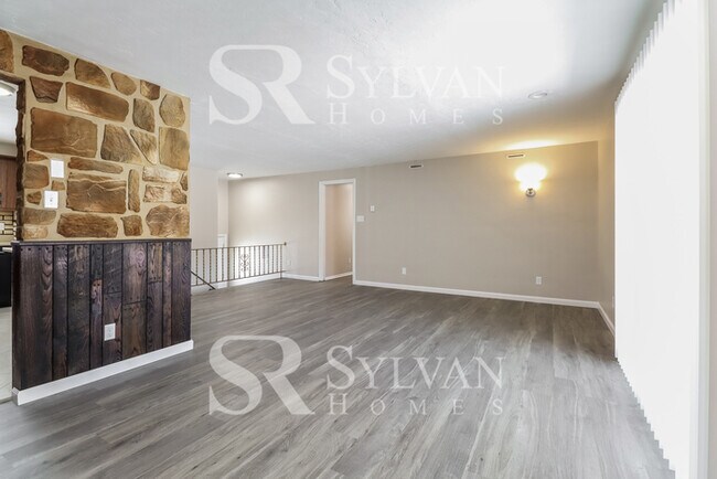 Building Photo - The living is easy in this 3 bedroom, 2 ba...