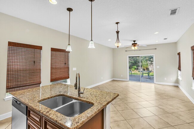 Building Photo - Beach living at it's finest! This 3 bedroo...