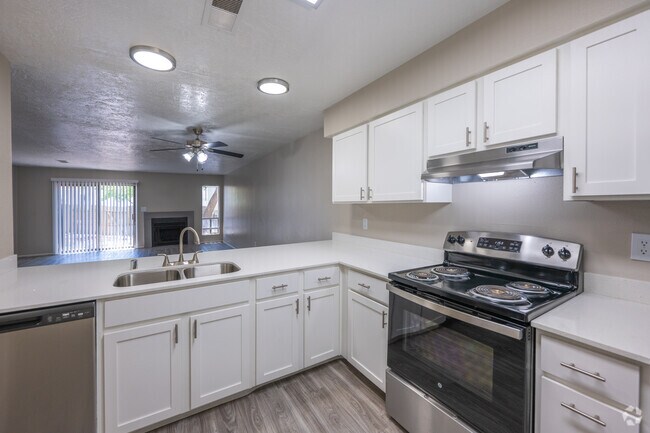 2BR, 2.5BA - 1,282SF - Kitchen and Living Room - Mesa Del Oso