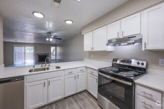 2BR, 2.5BA - 1,282SF - Kitchen and Living Room - Mesa Del Oso