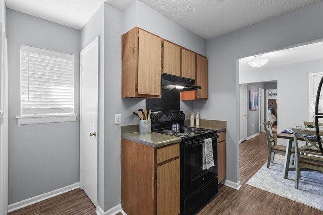 Cook and entertain in style in the fully equipped kitchens at Lakeland East Apartments in Flowood, MS. Managed by Highlands Vista Group. - Lakeland East Apartments