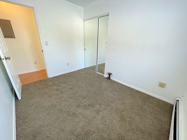 Building Photo - RARE FIND! Spacious and bright three bedro...