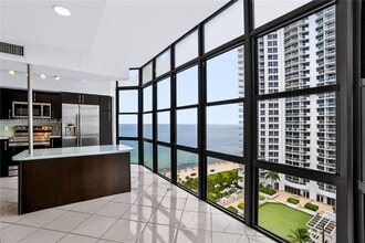 Building Photo - 6423 Collins Ave