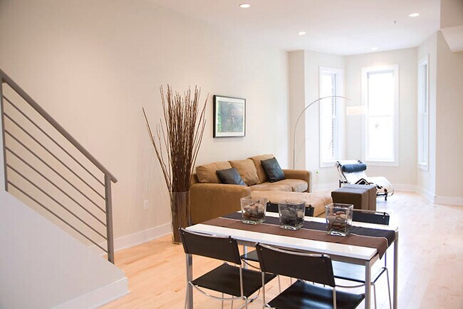 Open-concept dining area connects seamlessly with the kitchen and living space - 1123 6th St NW