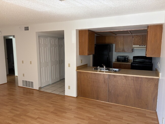 Building Photo - "One Month FREE with signed 12 month lease. Charming 1-Bedroom Condo Retreat with Fireplace and W...