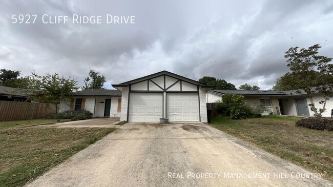 Building Photo - Three bedroom home with covered patio