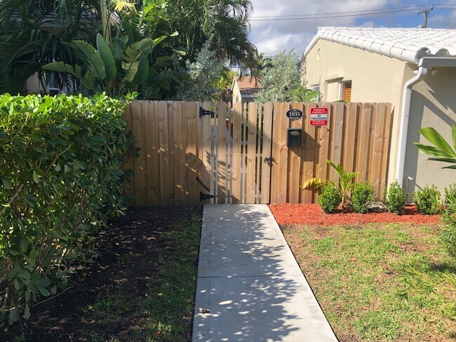 By the parking Gate Entrance - 1035 NE 13th Ave