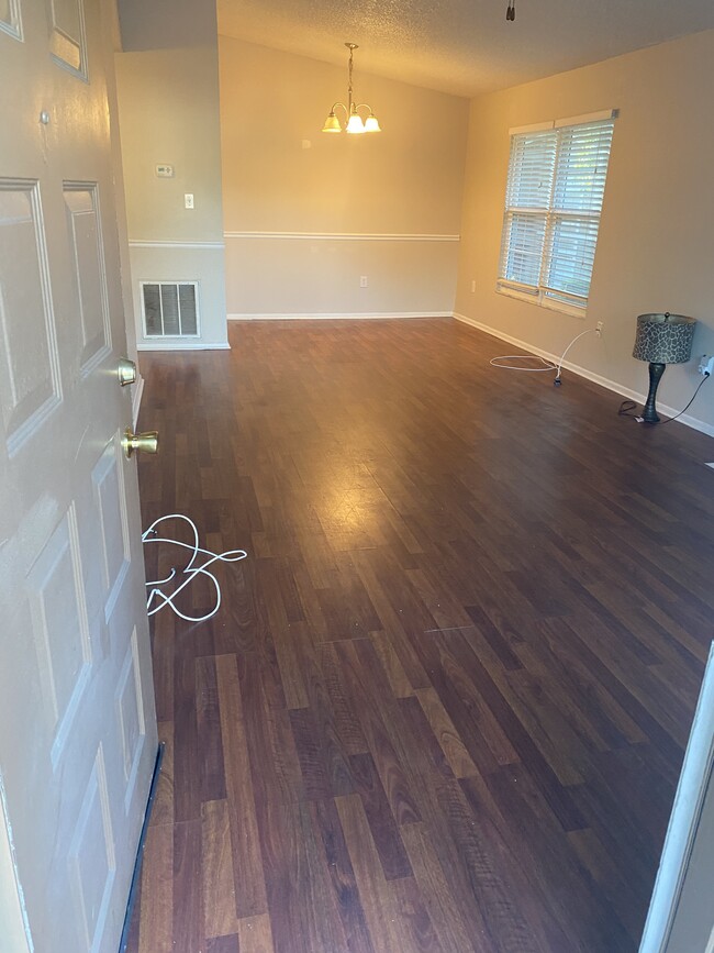 Living and dining room from front door - 14227 Shadow Moss Ln