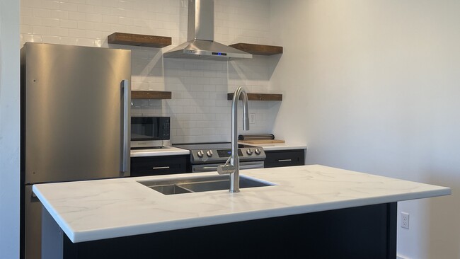 Includes dishwasher and microwave - 100 Second St