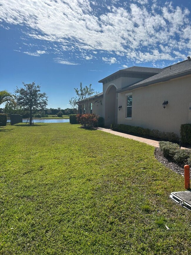 Building Photo - Lake Front Home In Lake Park at Tradition