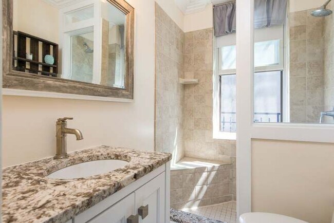 Updated bathroom with window facing courtyard - 413 1st St