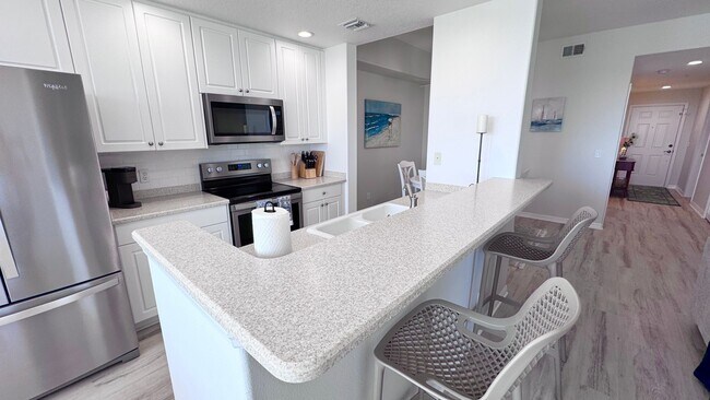 Foto del edificio - Elevated Luxury at The Terraces – 4th Floor Lake & Golf Course Views! 55+ Community!