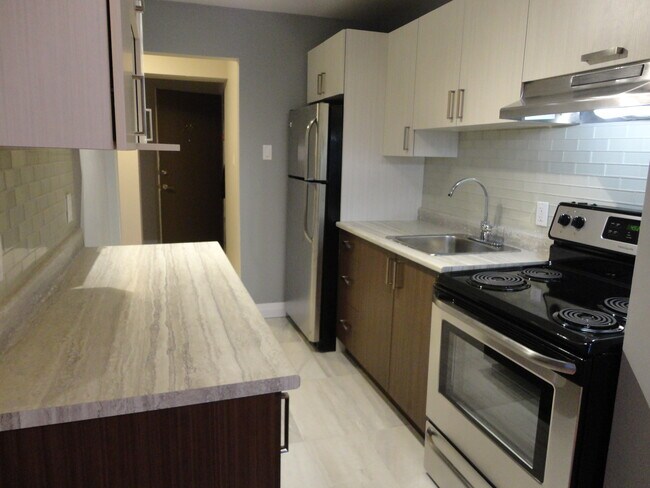 Building Photo - Unit 5 - 1404