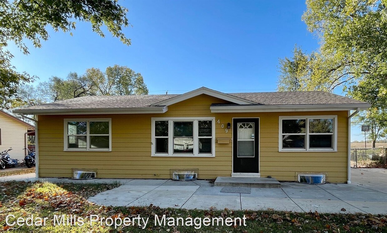 Foto principal - 4 br, 2 bath House - 409 W 7th St.