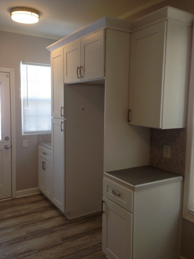 Lots of kitchen cabinets - 2418 E 16th St