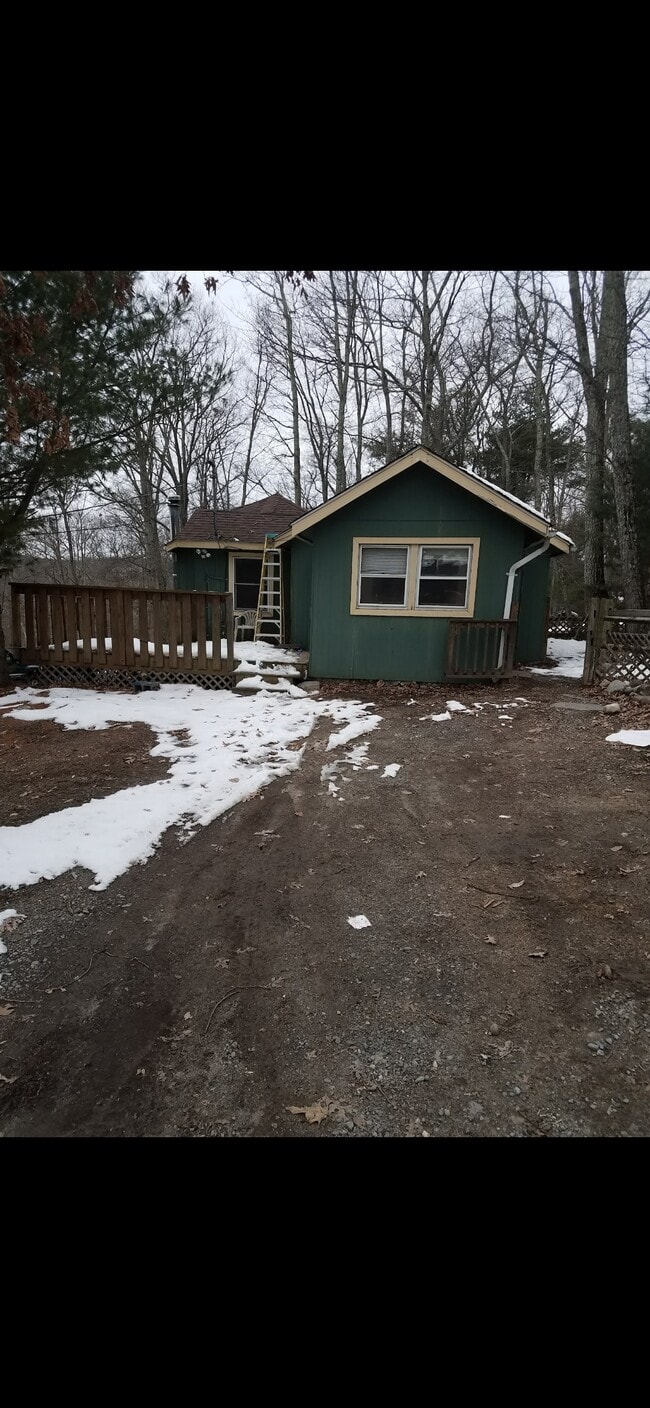 Side view of house showing parking - 33 Maple Trl