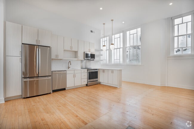 2 habitaciones, 2 baños - 952 pies cuadrados - Sala de estar y cocina - The Belknap