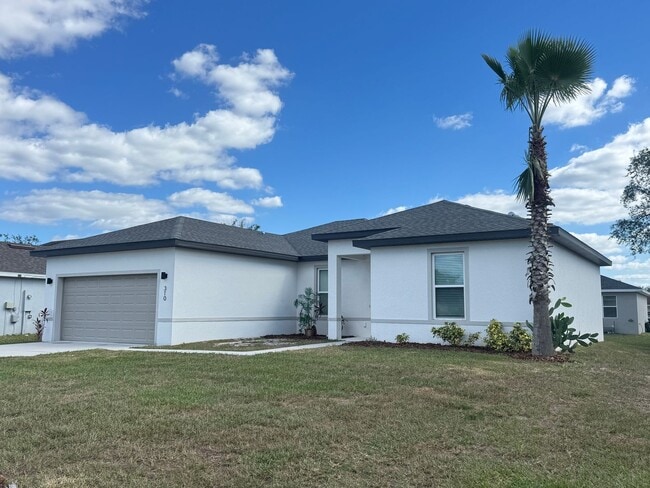 Building Photo - GORGEOUS 4 Bedroom, 2 Bathroom Home in Poi...