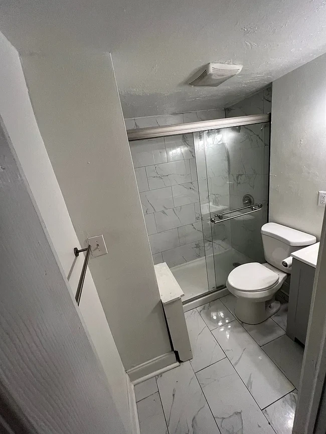 Fully renovated bathroom with new shower and flooring - 12 E Lancaster Ave