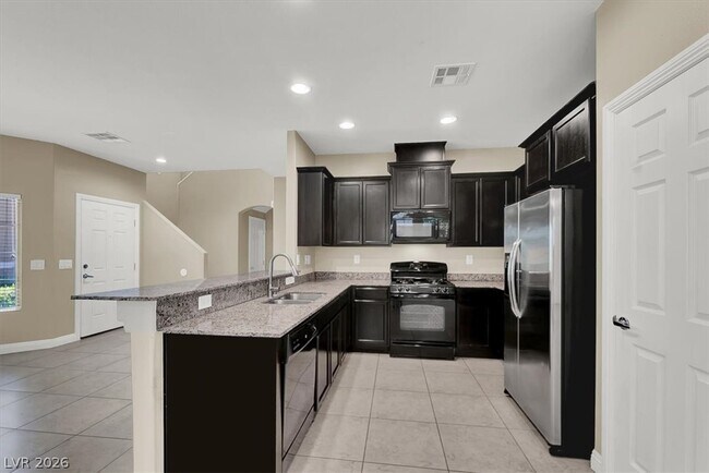 Foto del edificio - 9490 Alma Ridge Ave