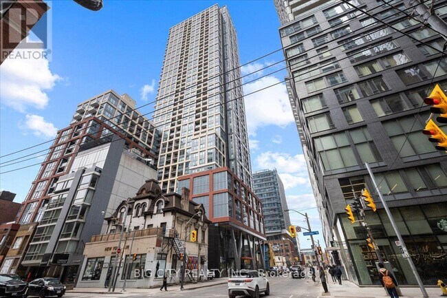 Building Photo - 108-4108 Peter St