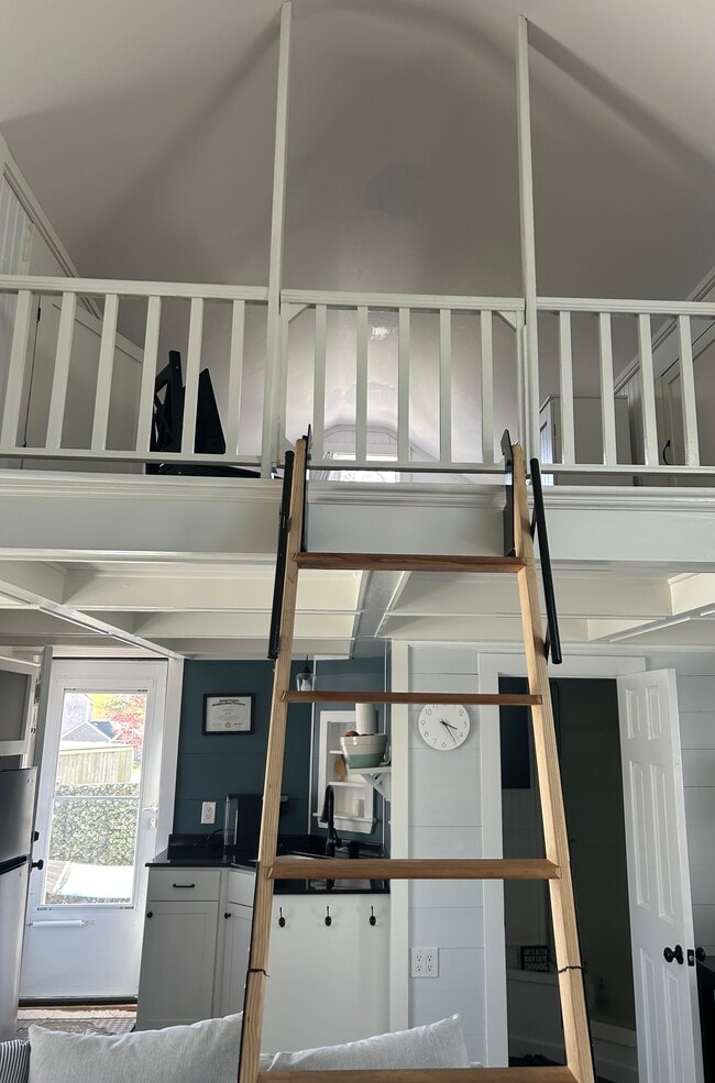 Retractable ladder leading to your cozy loft - 12 Howland Ave