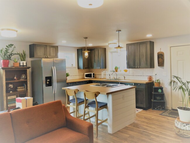 Kitchen area in great room - 910 Pacific Ave N