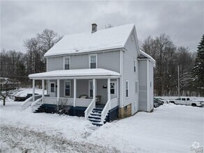 Building Photo - 102-104-104 N Helmer Ave