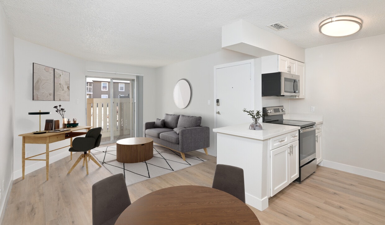 Enjoy floor to ceiling windows with ample natural light - Creekside