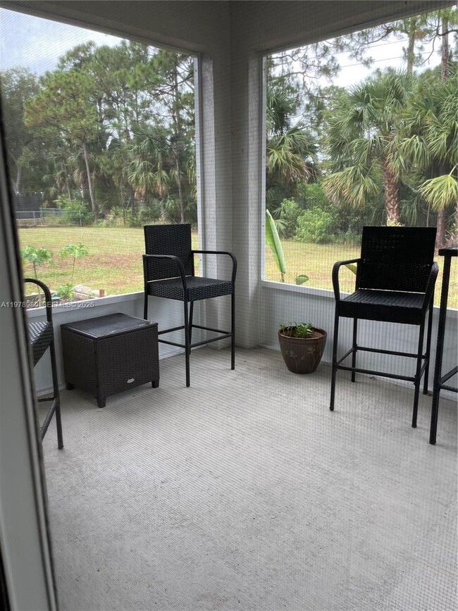 Building Photo - 6157 NW Gatun Dr