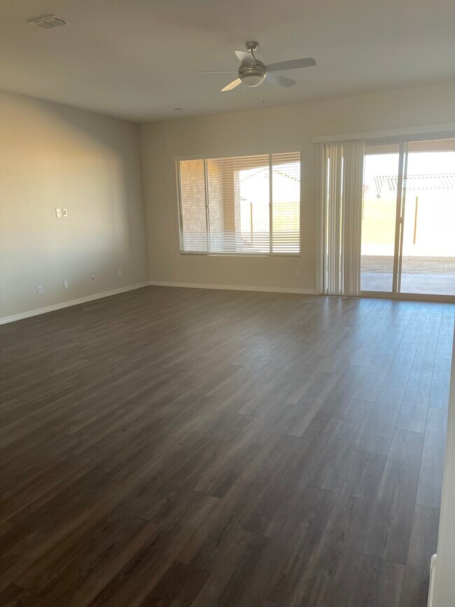 open living room - 27414 W Sierra Pinta Dr
