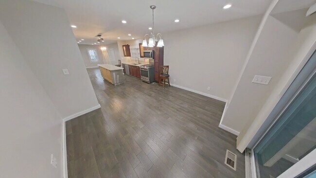 Foto del edificio - "Stunning 4-Bedroom Birmingham Home with 5 Full Baths, Granite Elegance, and a Finished Basement!"
