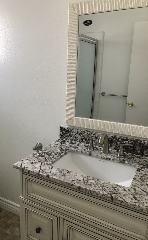 Bathroom granite countertop - 33962 Street of the Amber Lantern